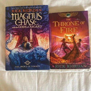 The throne of fire and Magnus chase and the throne of Asgard Rick Riordan books